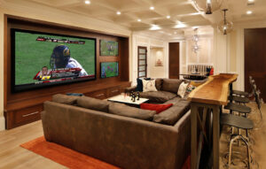 Mancave with couch and wide screen tv
